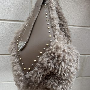 Bolso rizo Toupé