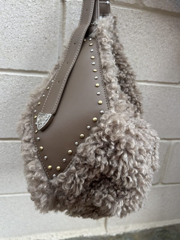 Bolso rizo Toupé